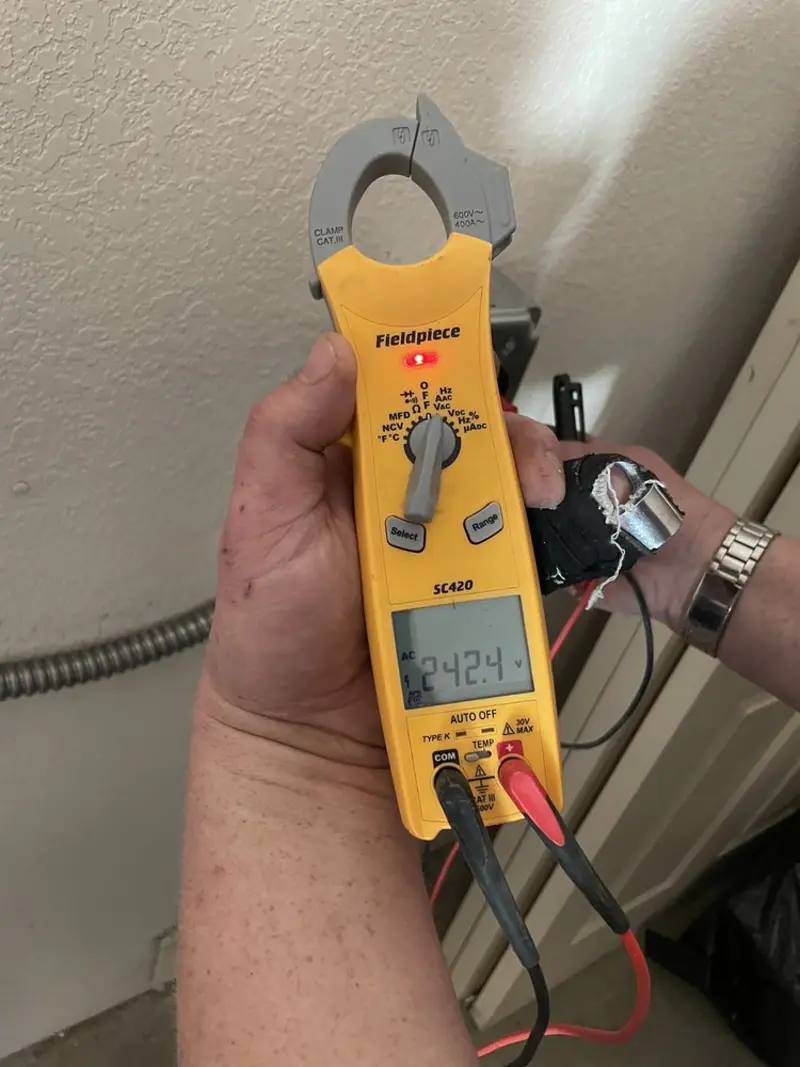 Voltage testing with clamp meter during Circuit Breaker Repair in Springdale